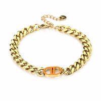 Stalen schakel armband goudkleur oranje 